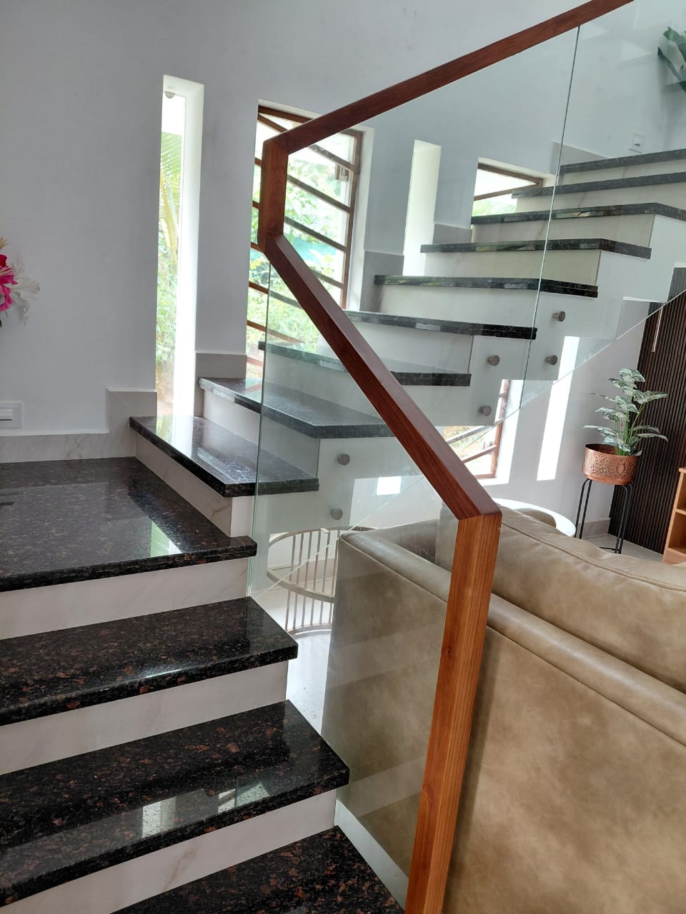 Staircase with tempered glass panels