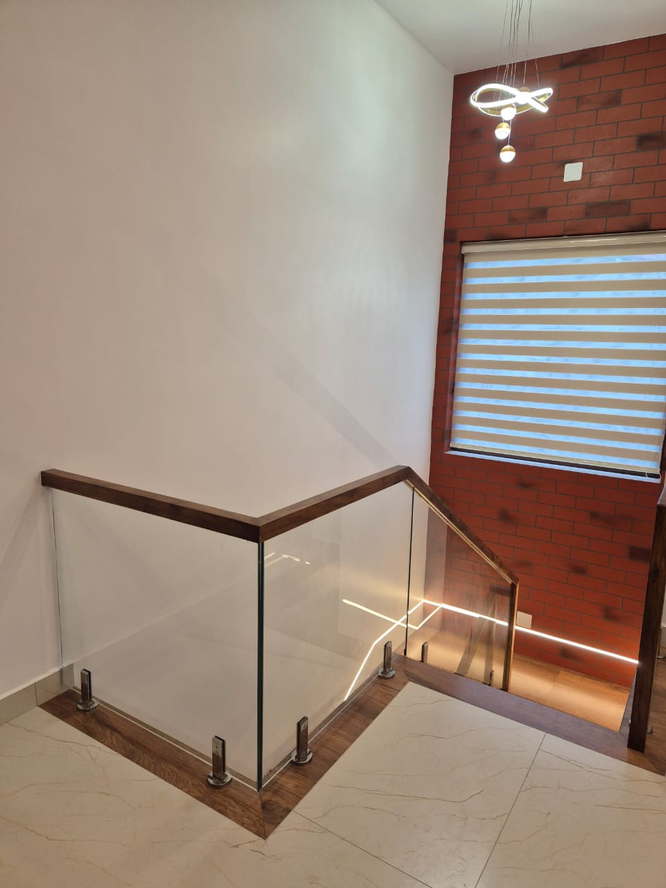 Staircase with glass and wood